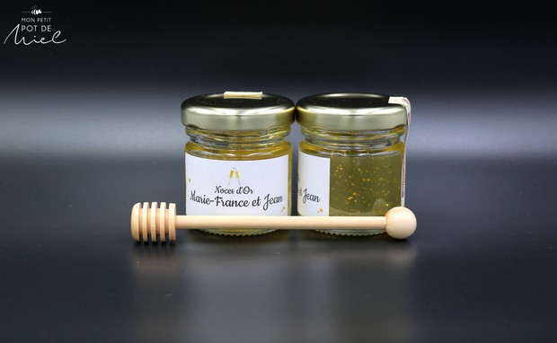 cadeau d'invité pour des noces d'or avec un petit pot de miel acacia & paillettes en or alimentaire